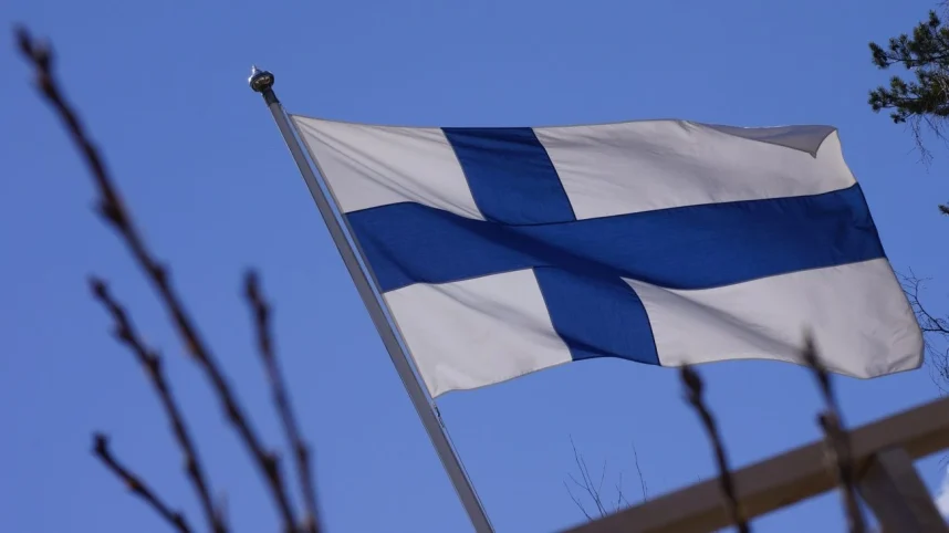 The flag of Finland against a blue sky